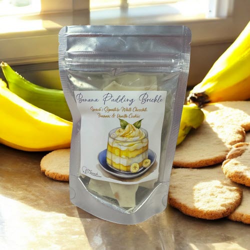 Banana Pudding Brickle label with watercolor drawing of pudding dessert on blue plate with shortbread and bananas in background