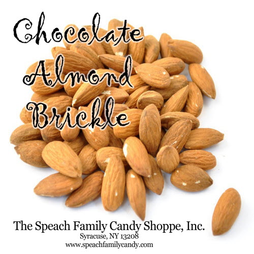 chocolate almond brickle roasted almonds piled up on white background