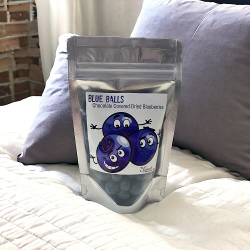 Blue Balls Package on Bed with Pilliows