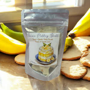 Banana Pudding Brickle label with watercolor drawing of pudding dessert on blue plate with shortbread and bananas in background