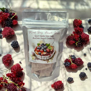 Mixed Berry Compote bag on countertop with various berries